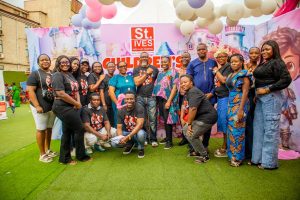 Dr. Okewale and wife (middle) with staff of St. Ives hospital