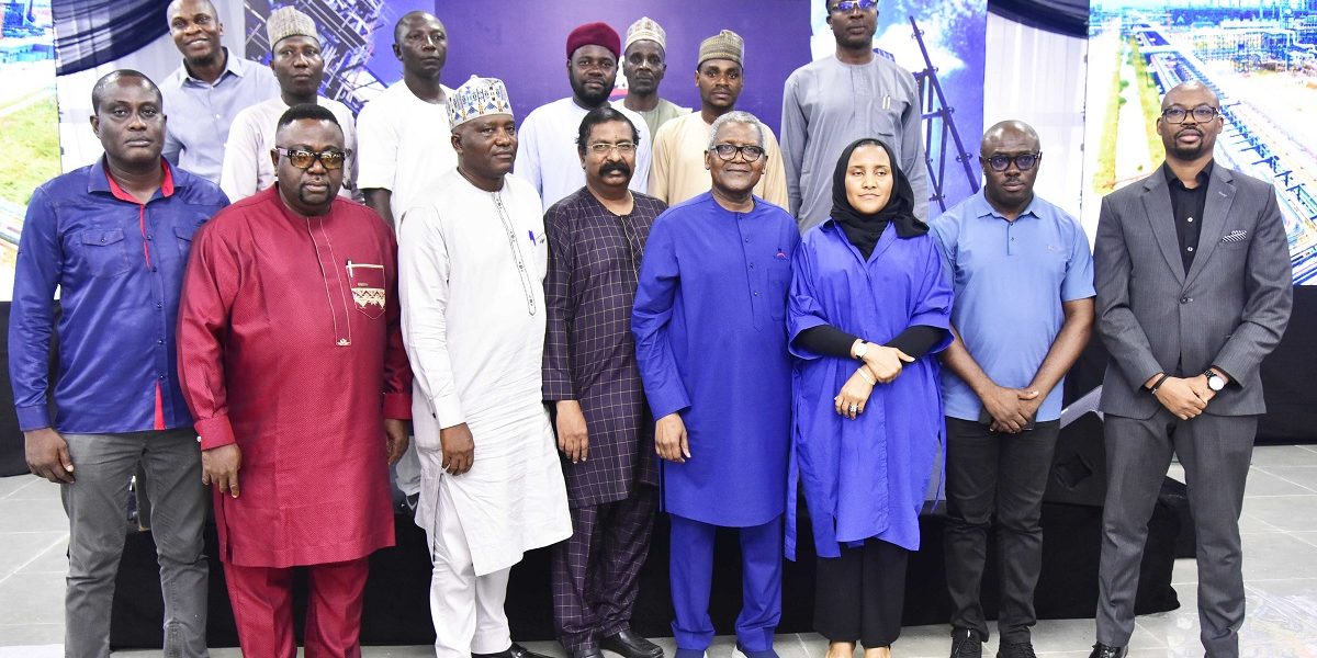 Vice President, Oil & Gas, Dangote Industries Limited, Devakumar Edwin; President/CE, Dangote Industries Limited, Aliko Dangote; Group Executive Director, Commercial Operations, Dangote Industries Limited, Fatima Aliko-Dangote, with Media Executives during the Media Executives visit/Parley at the Dangote Petroleum Refinery and Dangote Fertiliser Limited in Lagos on July 14, 2024.