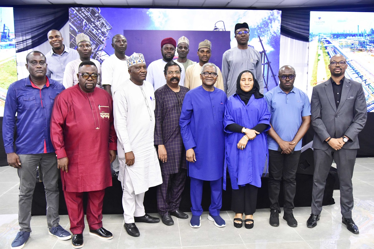 Vice President, Oil & Gas, Dangote Industries Limited, Devakumar Edwin; President/CE, Dangote Industries Limited, Aliko Dangote; Group Executive Director, Commercial Operations, Dangote Industries Limited, Fatima Aliko-Dangote, with Media Executives during the Media Executives visit/Parley at the Dangote Petroleum Refinery and Dangote Fertiliser Limited in Lagos on July 14, 2024.